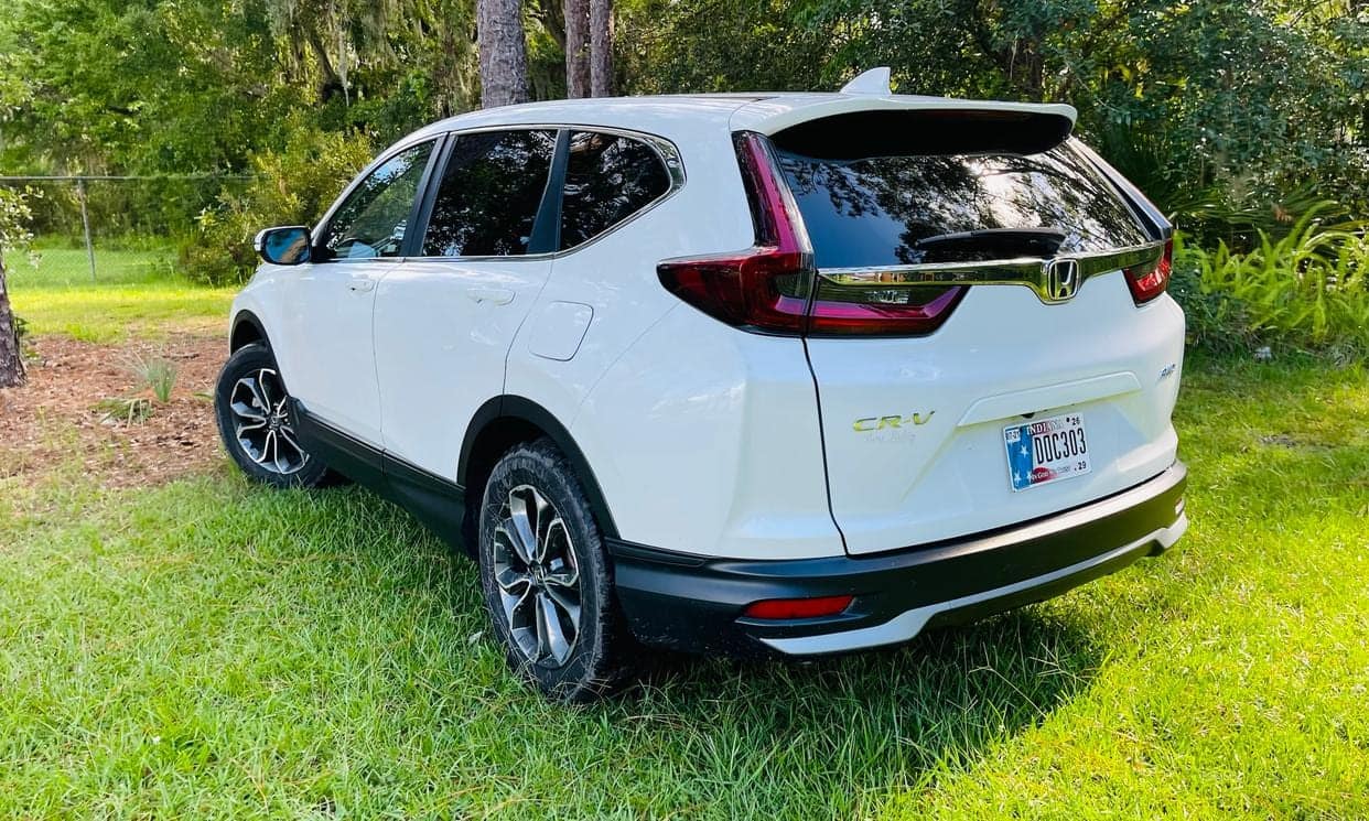 Rear three-quarter view of the white Honda CR-V