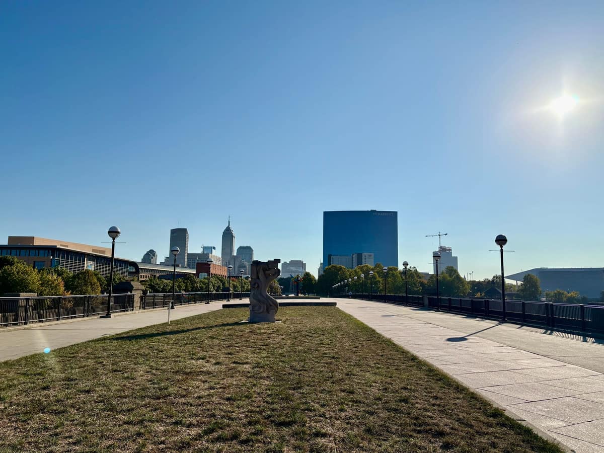 Indianapolis skyline beyond the paths and lawns of the White River promenade