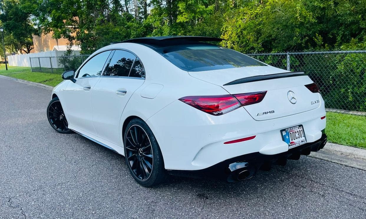 Rear three-quarter view of the white Mercedes-Benz CLA