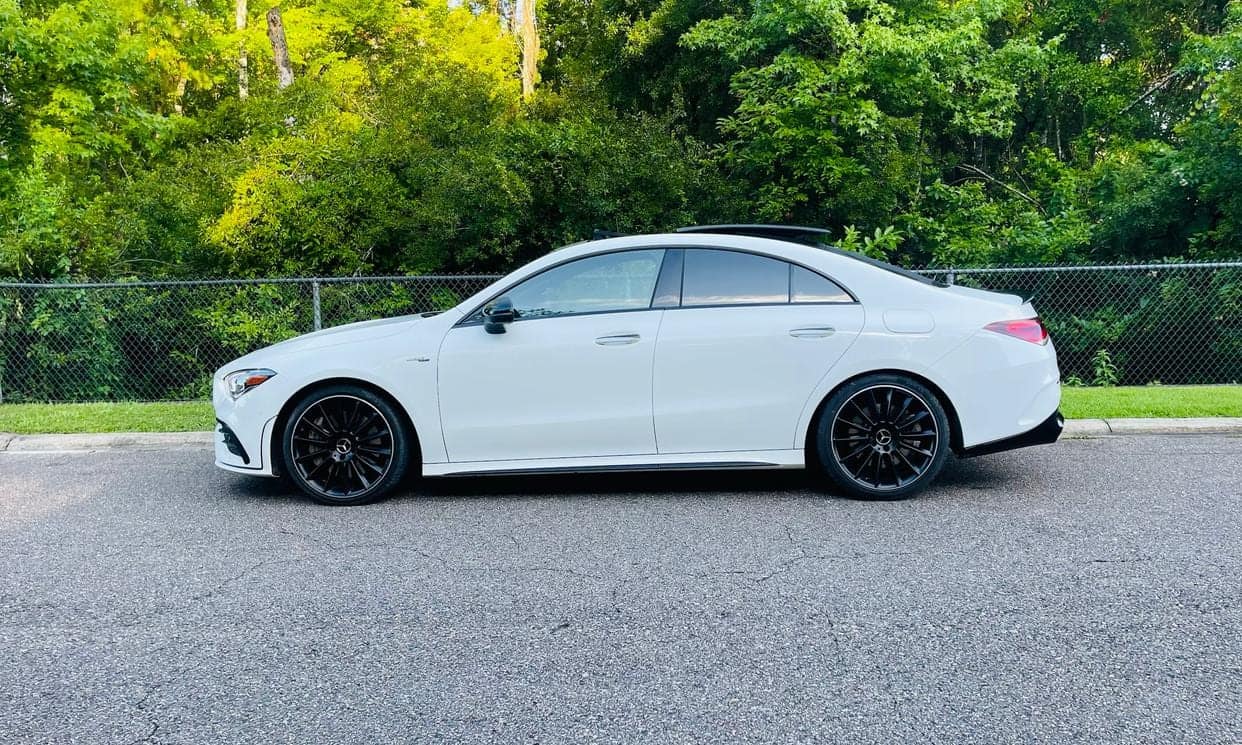 Side profile of the Mercedes-Benz CLA with black wheels