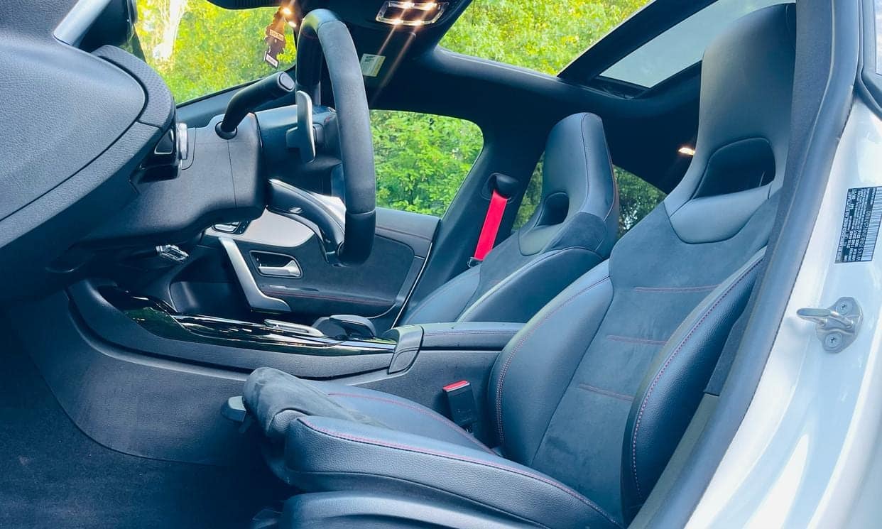 Front sport seats of the Mercedes-Benz CLA with red stitching