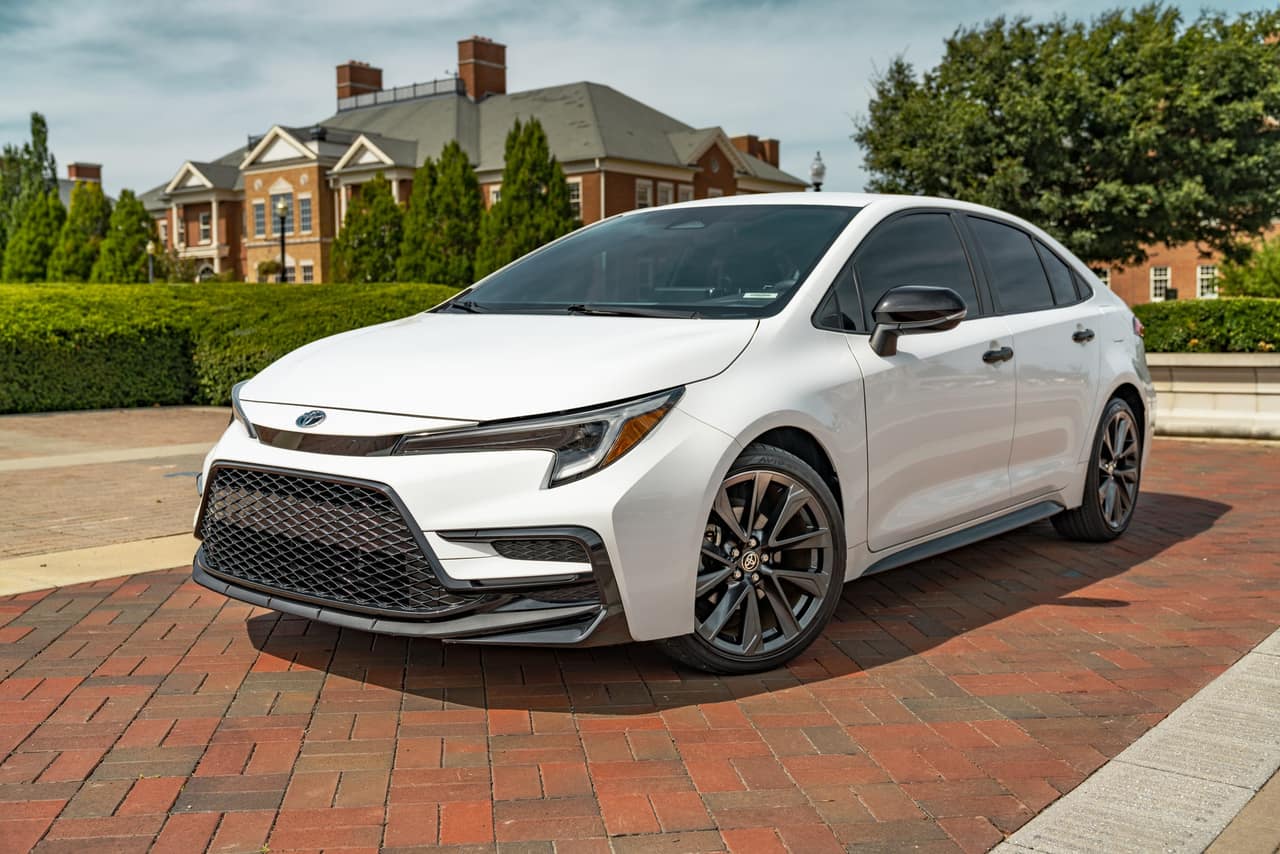 White Toyota Corolla Hybrid SE, front three-quarter view