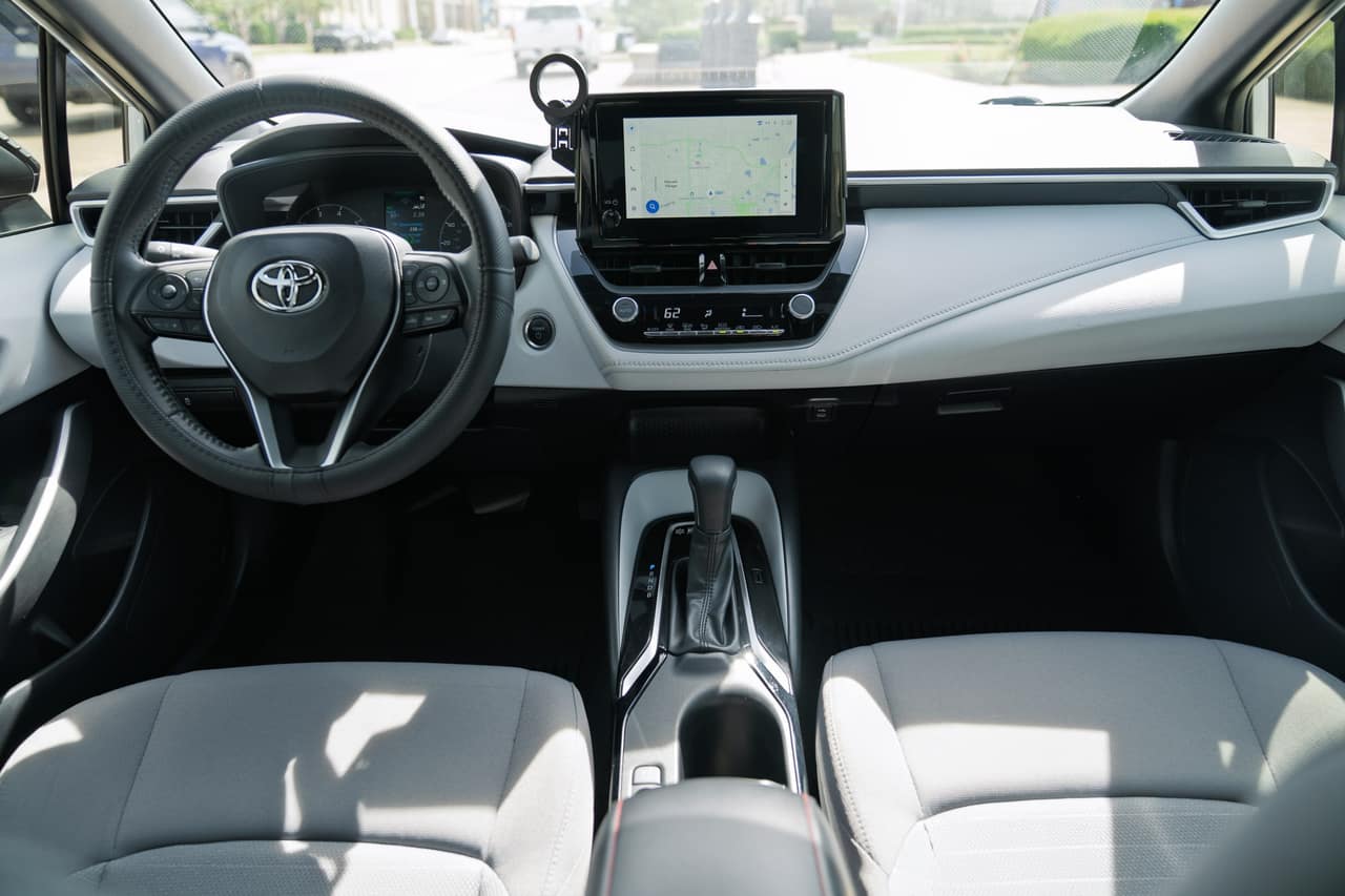 Toyota Corolla dashboard, steering wheel, touchscreen, and center console