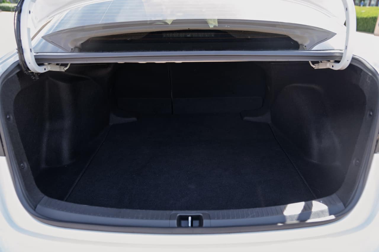 Open Toyota Corolla trunk showing its lined cargo space