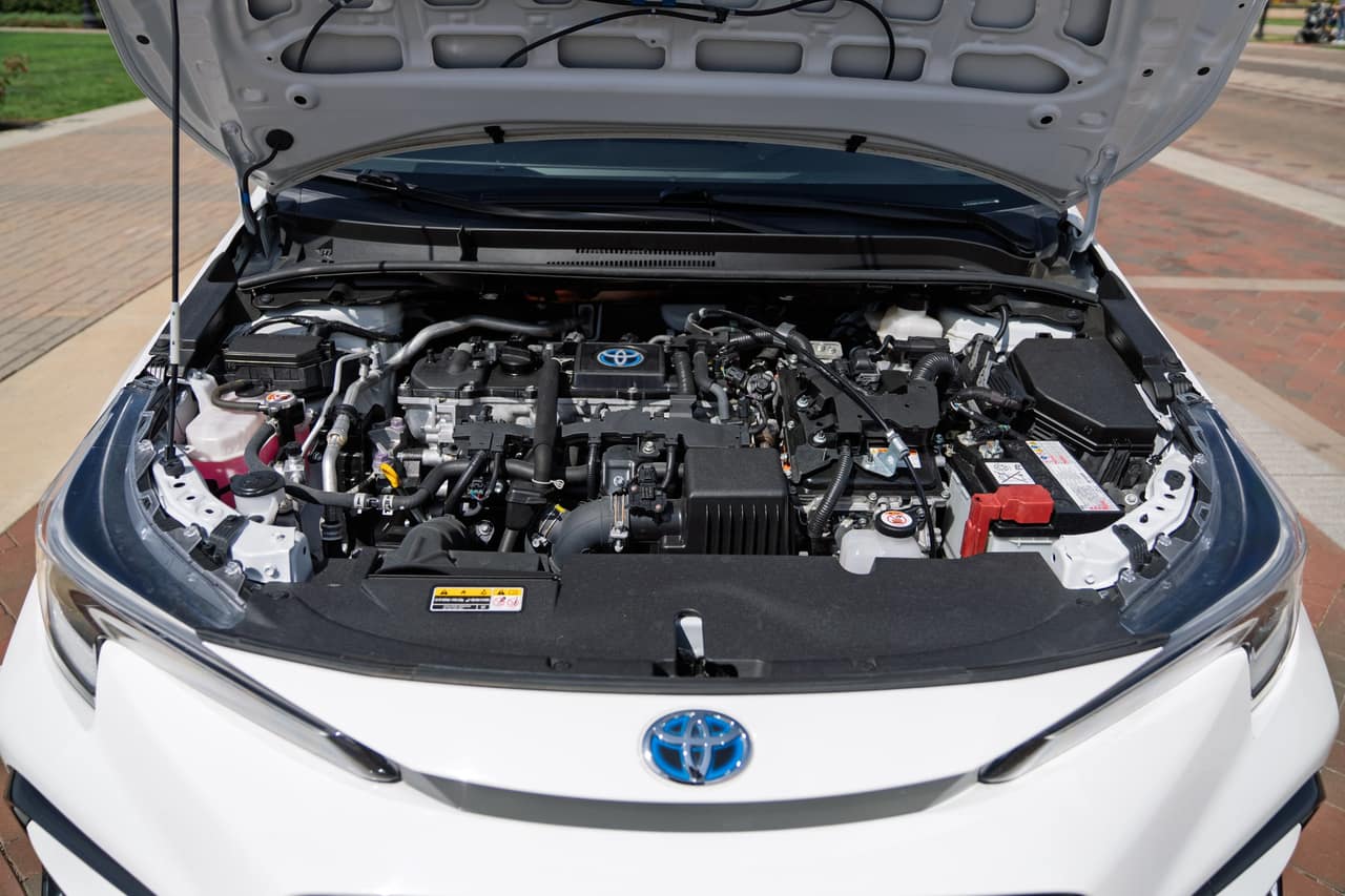 Toyota Corolla engine compartment beneath the raised hood