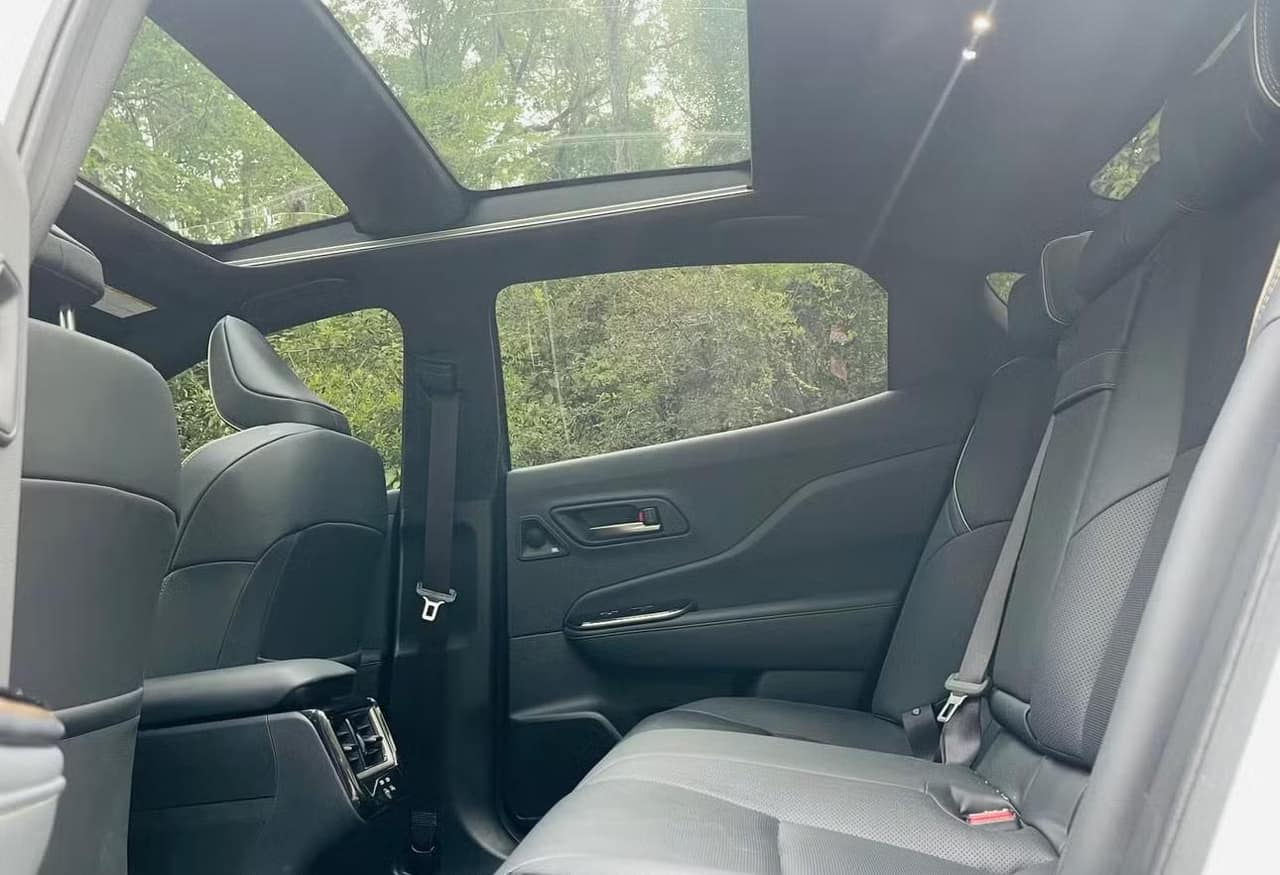 Rear cabin of the Toyota Crown beneath the panoramic glass roof