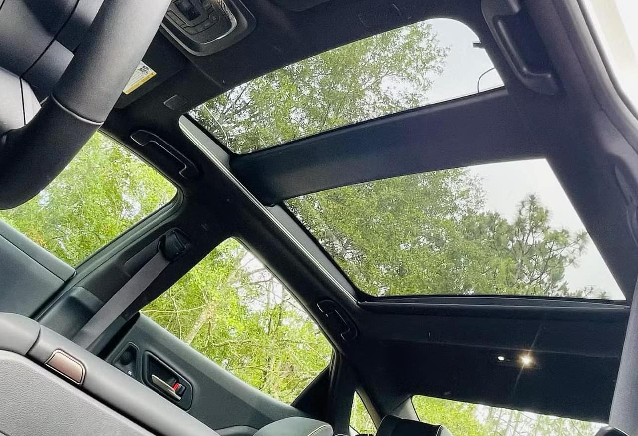 Panoramic glass roof of the Toyota Crown seen from inside