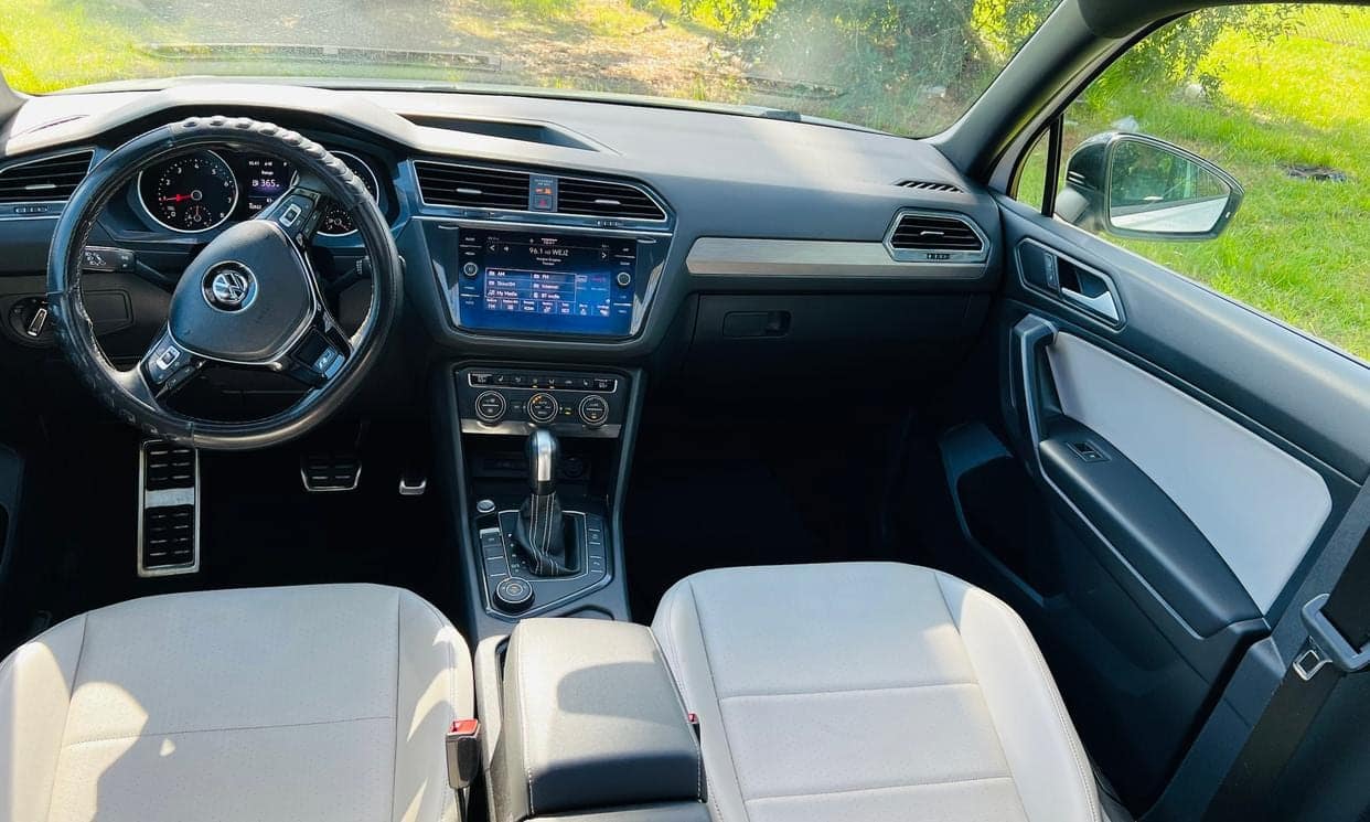 Volkswagen Tiguan dashboard and light-colored front seats